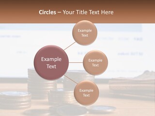 A Pile Of Coins Sitting On Top Of A Wooden Table PowerPoint Template