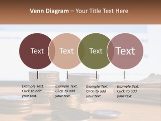 A Pile Of Coins Sitting On Top Of A Wooden Table PowerPoint Template