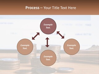 A Pile Of Coins Sitting On Top Of A Wooden Table PowerPoint Template