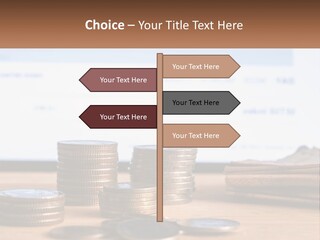 A Pile Of Coins Sitting On Top Of A Wooden Table PowerPoint Template