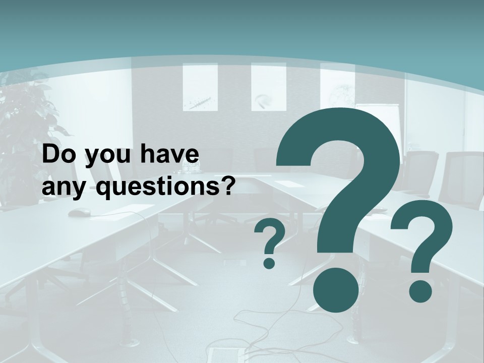 A Conference Room With A Long Table And Chairs PowerPoint Template