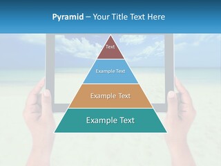 A Person Holding A Tablet With A Beach In The Background PowerPoint Template