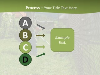 A Man Is Mowing The Grass With A Lawn Mower PowerPoint Template