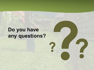 A Man Is Mowing The Grass With A Lawn Mower PowerPoint Template
