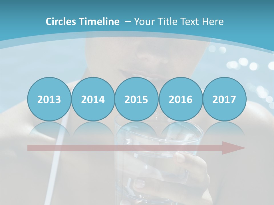 A Woman Holding A Glass Of Water In Her Hand PowerPoint Template