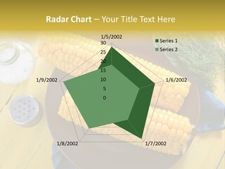 Corn On The Cob On A Plate With Salt And Pepper PowerPoint Template