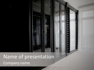 A Black And White Photo Of A Room With Glass Doors PowerPoint Template