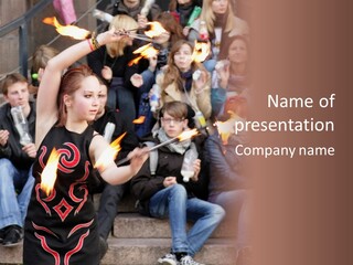 A Group Of People Sitting On Steps With Torches In Their Hands PowerPoint Template