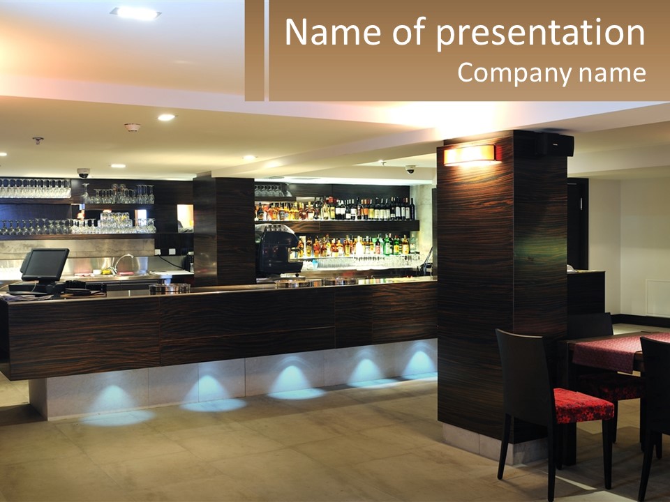 A Restaurant With A Bar And A Laptop On The Counter PowerPoint Template