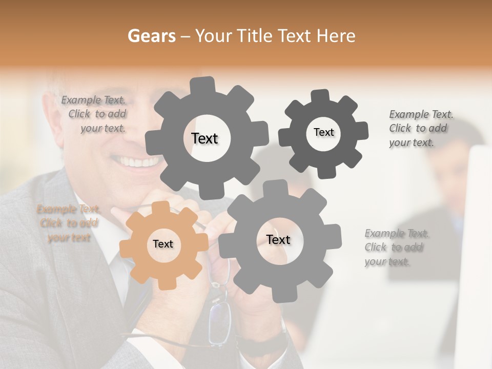 A Man In A Business Suit Sitting In Front Of A Laptop PowerPoint Template