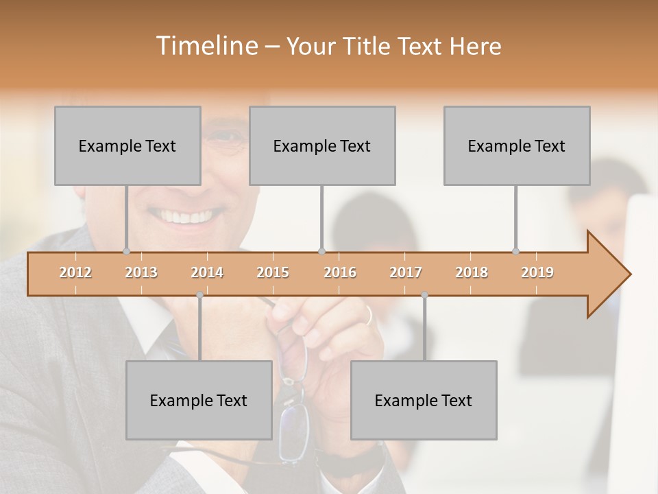 A Man In A Business Suit Sitting In Front Of A Laptop PowerPoint Template