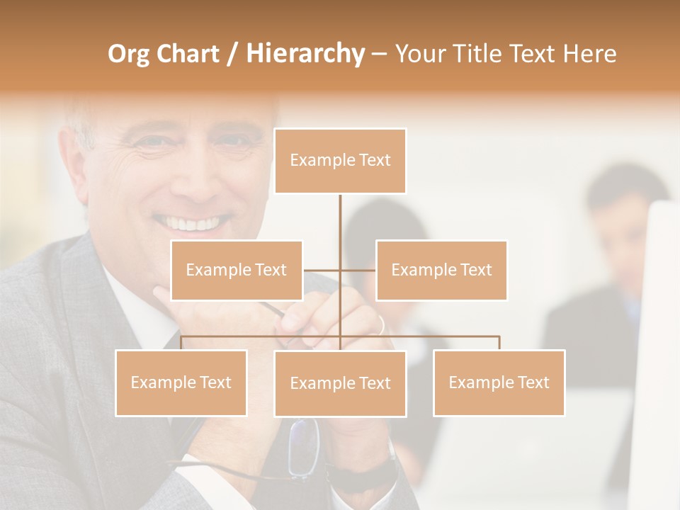 A Man In A Business Suit Sitting In Front Of A Laptop PowerPoint Template
