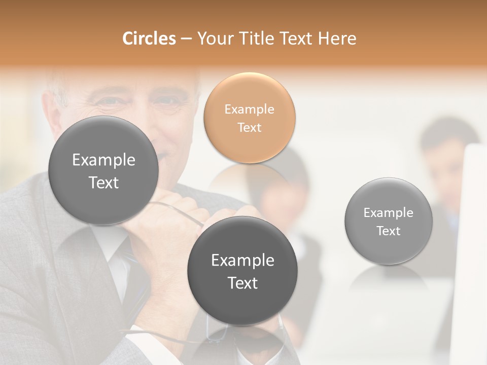 A Man In A Business Suit Sitting In Front Of A Laptop PowerPoint Template