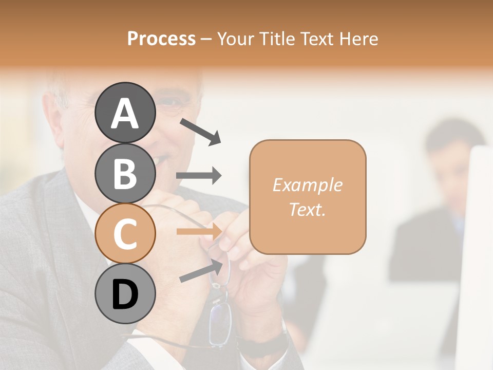 A Man In A Business Suit Sitting In Front Of A Laptop PowerPoint Template