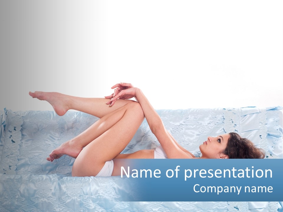 A Woman Laying On Top Of A Blue Bed PowerPoint Template