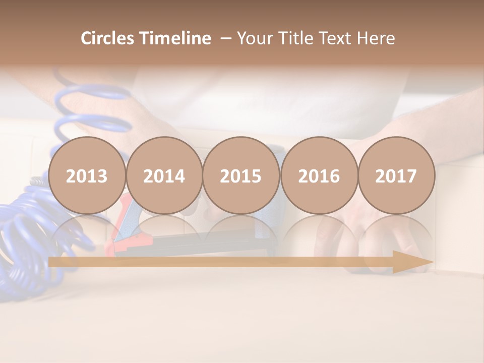 A Person Using A Power Tool On A Piece Of Furniture PowerPoint Template