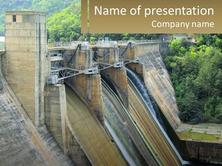 A Large Dam With Water Coming Out Of It PowerPoint Template