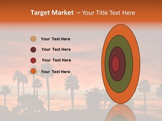 A Sunset With Palm Trees In The Foreground PowerPoint Template