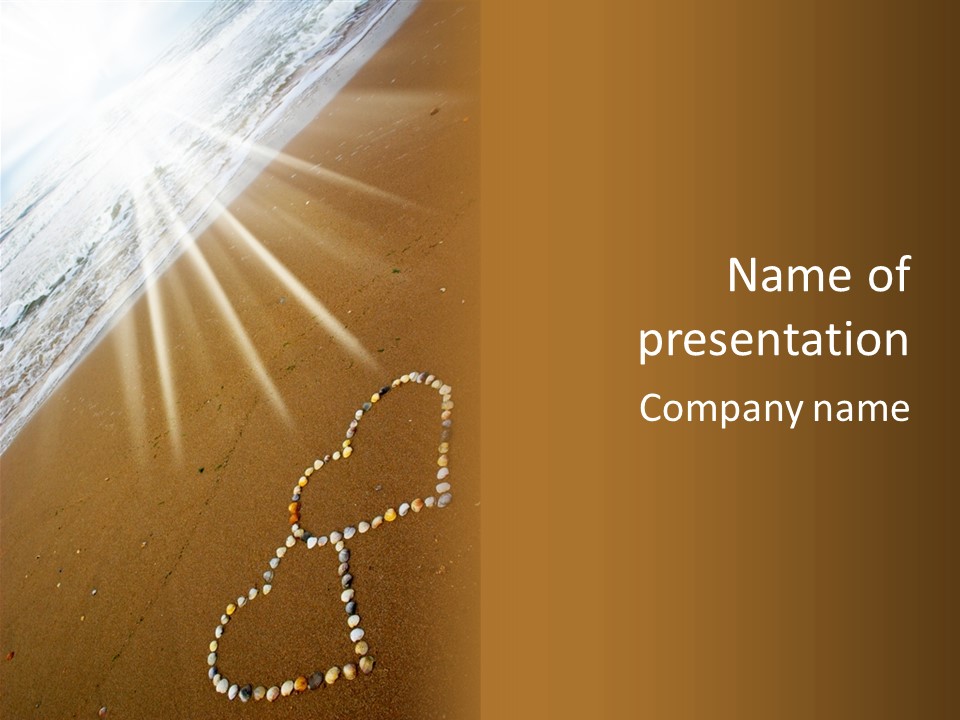 A Heart Drawn In The Sand On A Beach PowerPoint Template