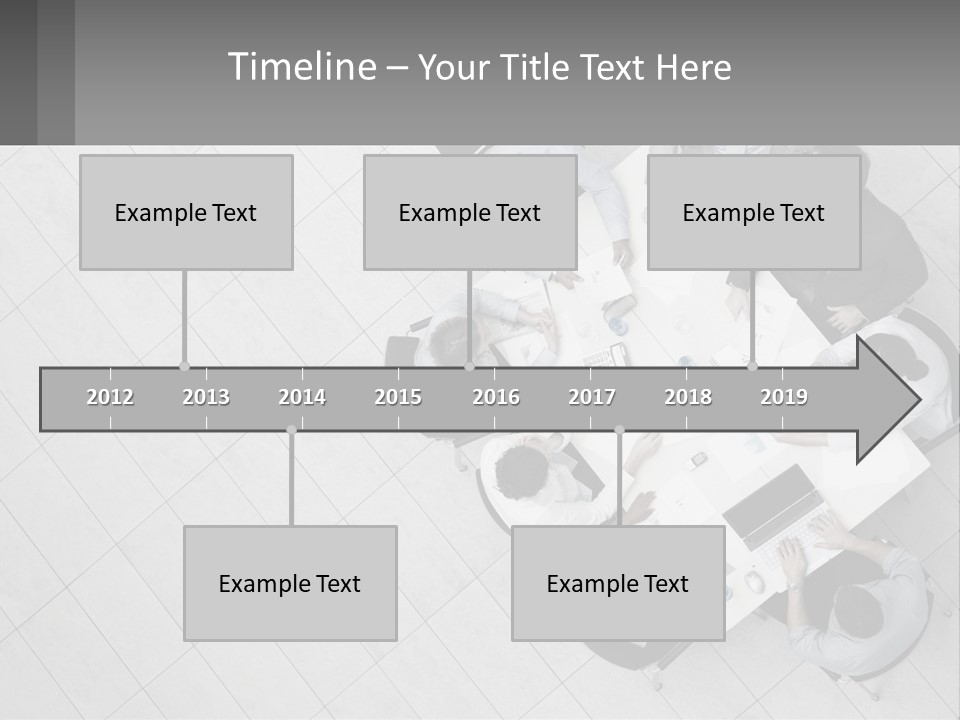 A Group Of People Sitting Around A Table PowerPoint Template
