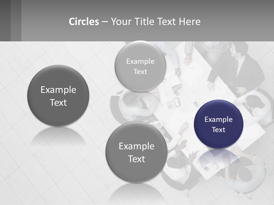 A Group Of People Sitting Around A Table PowerPoint Template