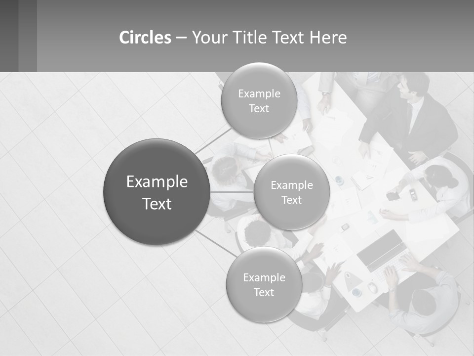 A Group Of People Sitting Around A Table PowerPoint Template