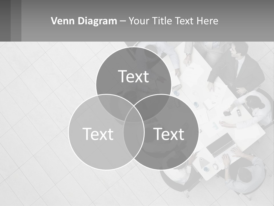 A Group Of People Sitting Around A Table PowerPoint Template