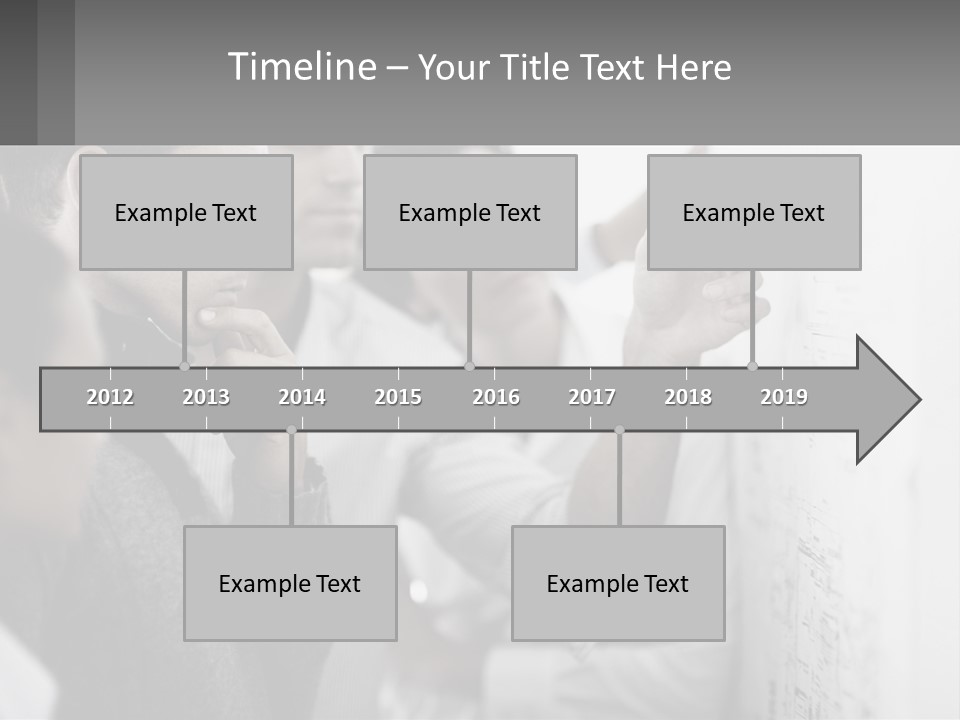 A Group Of People Looking At A Whiteboard PowerPoint Template