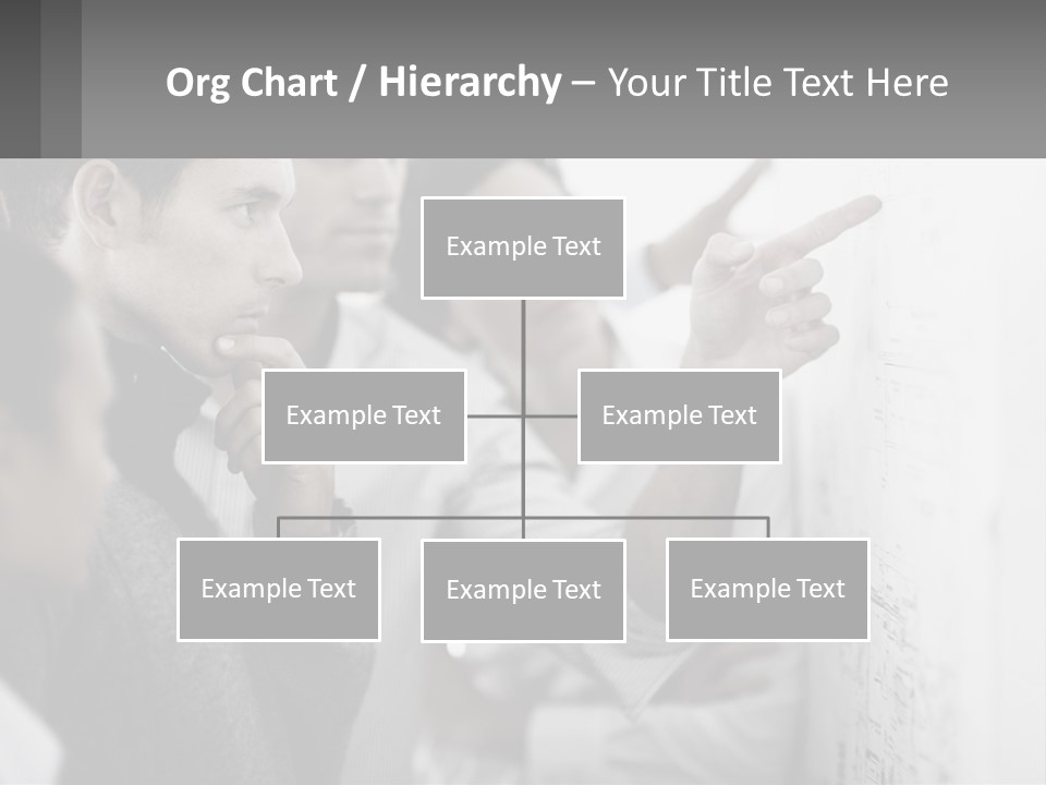 A Group Of People Looking At A Whiteboard PowerPoint Template