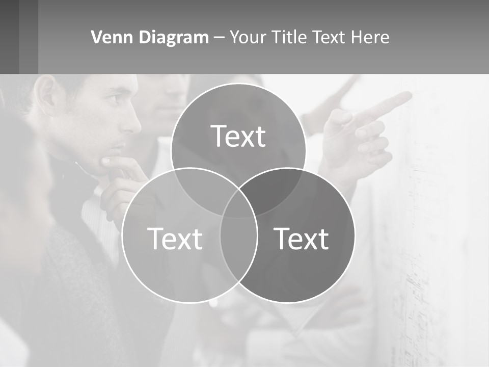 A Group Of People Looking At A Whiteboard PowerPoint Template
