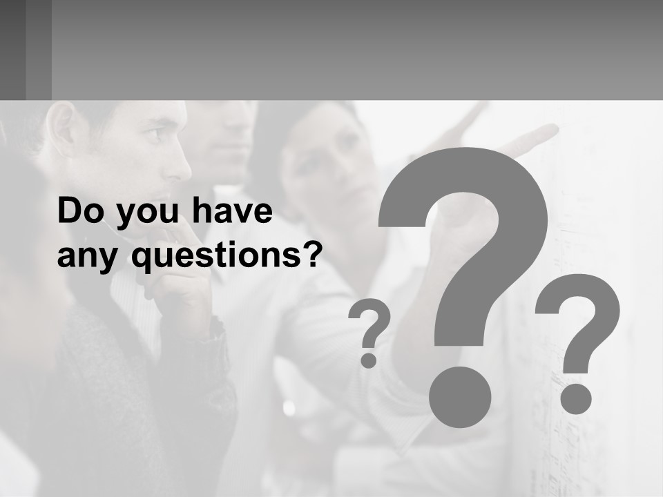 A Group Of People Looking At A Whiteboard PowerPoint Template