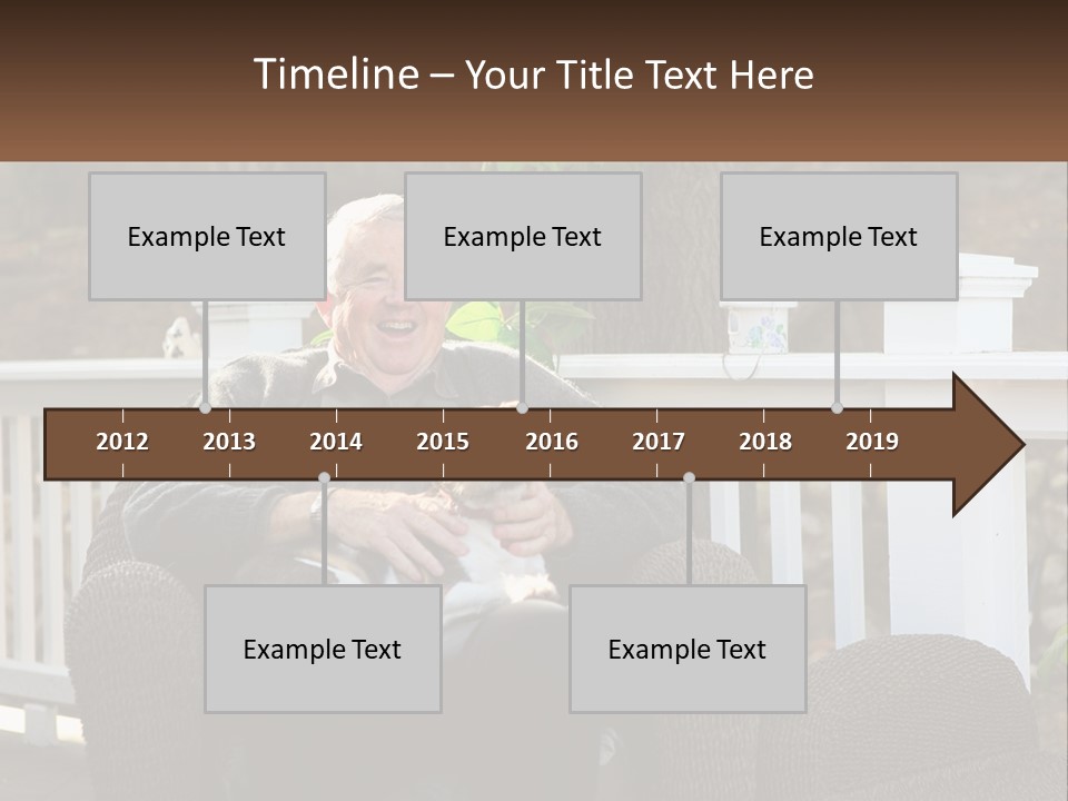 A Man Sitting On A Chair Holding A Dog PowerPoint Template