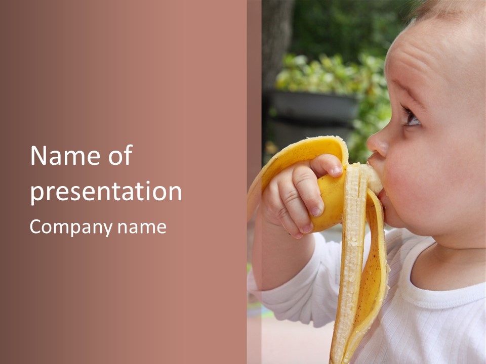 A Baby Eating A Banana With A Brown Background PowerPoint Template