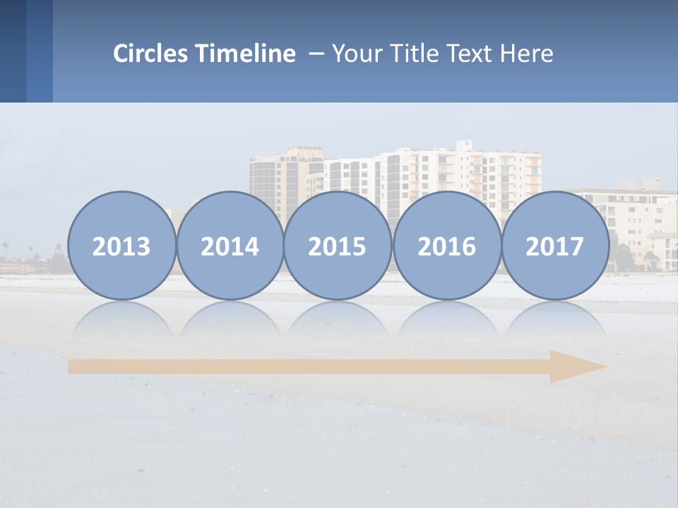 A Beach With A Building In The Background PowerPoint Template