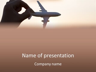 A Person Holding A Plane In Their Hand PowerPoint Template