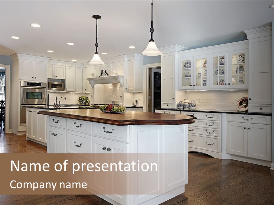 A Large Kitchen With White Cabinets And A Center Island PowerPoint Template