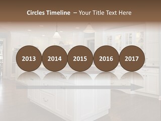 A Large Kitchen With White Cabinets And A Center Island PowerPoint Template