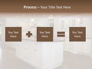 A Large Kitchen With White Cabinets And A Center Island PowerPoint Template