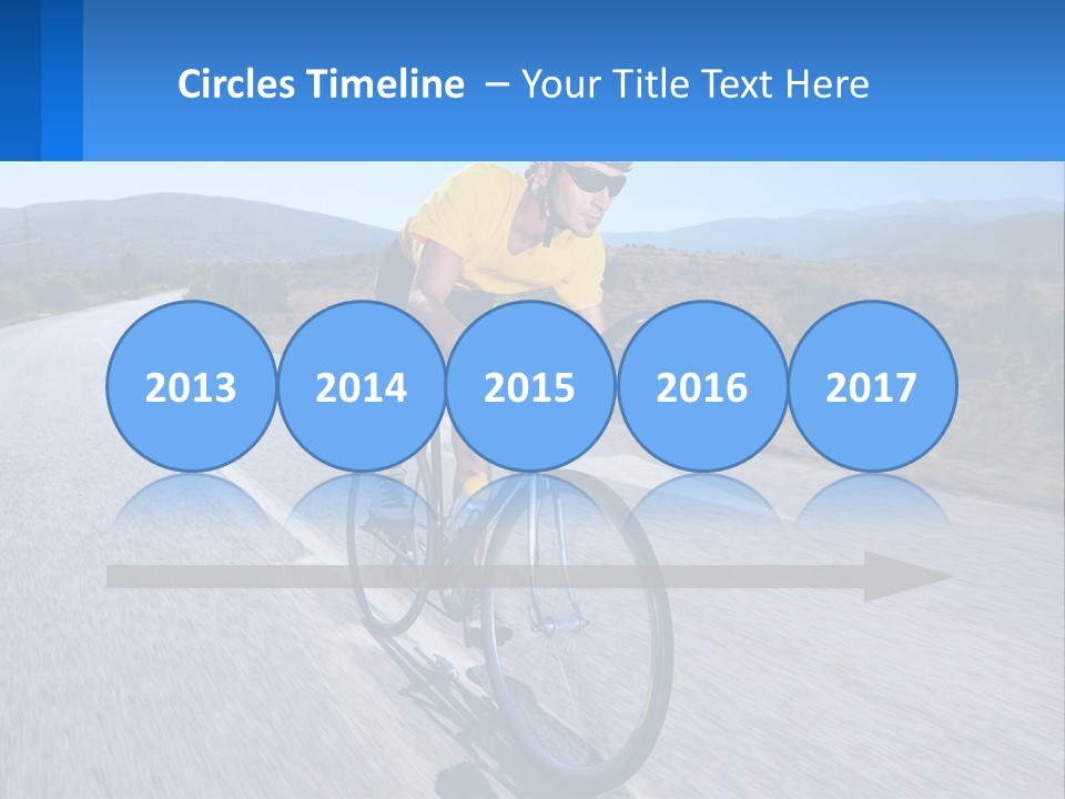 A Man Riding A Bike Down A Road PowerPoint Template
