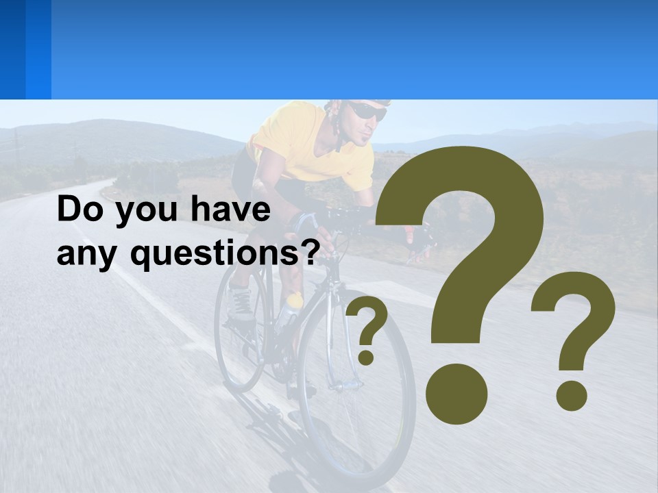 A Man Riding A Bike Down A Road PowerPoint Template