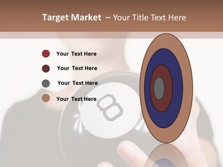 A Woman Holding A Black Ball With A White Letter B On It PowerPoint Template