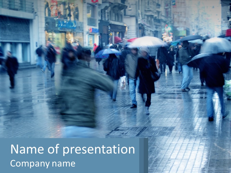 A Group Of People Walking Down A Street Holding Umbrellas PowerPoint Template