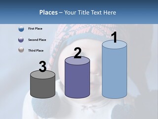 A Baby Wearing A Hat With Pom Poms PowerPoint Template