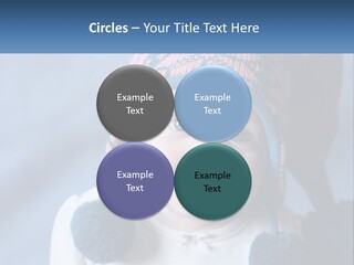 A Baby Wearing A Hat With Pom Poms PowerPoint Template