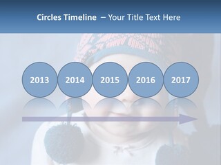 A Baby Wearing A Hat With Pom Poms PowerPoint Template
