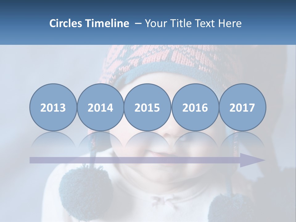 A Baby Wearing A Hat With Pom Poms PowerPoint Template