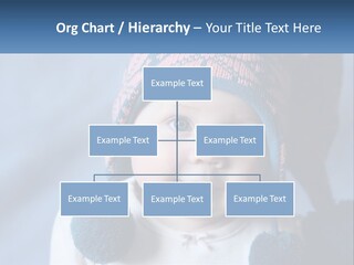 A Baby Wearing A Hat With Pom Poms PowerPoint Template