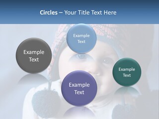 A Baby Wearing A Hat With Pom Poms PowerPoint Template