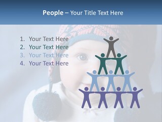 A Baby Wearing A Hat With Pom Poms PowerPoint Template