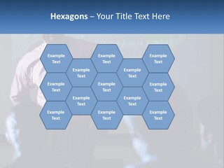 A Man In A Pink Shirt And Tie Standing In Front Of A Projector Screen PowerPoint Template